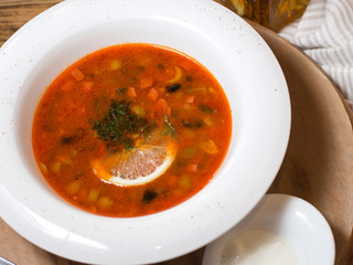 Red soup with lemon