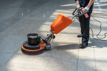 machine cleaning floor - Powered by Adobe