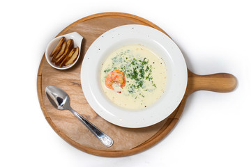 Soup Cream Shrimp on a White Plate on a Tree white background