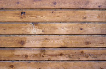 Naklejka premium Brown wooden panels arranged horizontally. Wooden texture & background