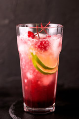 Alcoholic cocktail sour cherry gin or porch crawler. Lemonade.