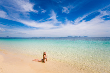 Fototapeta na wymiar Yoga on tropical thai beach