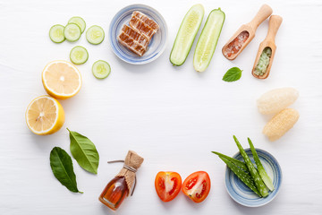 Natural herbal skin care products. Top view ingredients c on table concept of the best all natural face moisturizer. Facial treatment preparation background.