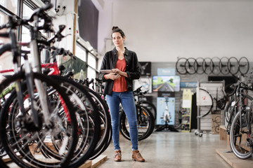 Portrait of a small business owner in a bicycle store