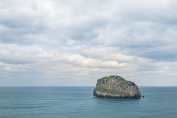 beautiful rock island isolated in the sea.