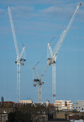 Fototapeta na wymiar Cranes - Construction - Construction Site - Building. New Hospital under construction, Brighton, East Sussex, UK