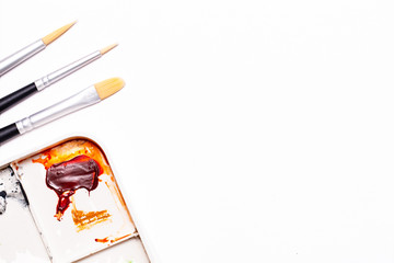 Background for art concept Watercolor painting Brush set and watercolor palette on white background