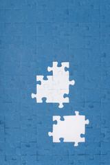 Fototapeta premium top view of puzzles with missing elements, business concept