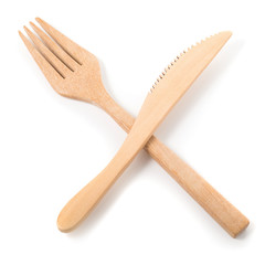 Set of wooden cutlery isolated on a white background
