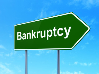 Business concept: Bankruptcy on green road highway sign, clear blue sky background, 3D rendering