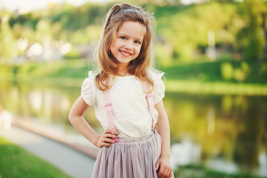 cute little girl in summer park