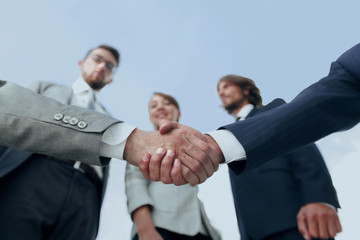 in the foreground.handshake of business partners