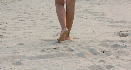 lady walk on the beach