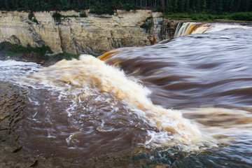 Alexandra Falls tumble 32 meters over the Hay River, Twin Falls Gorge Territorial Park Northwest territories, Canada. Long exposure