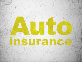 Insurance concept: Yellow Auto Insurance on textured concrete wall background