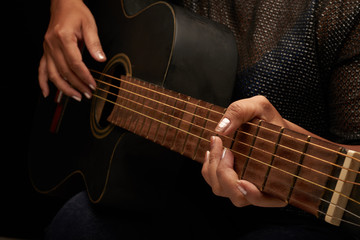 Fototapeta na wymiar Playing Acoustic Guitar
