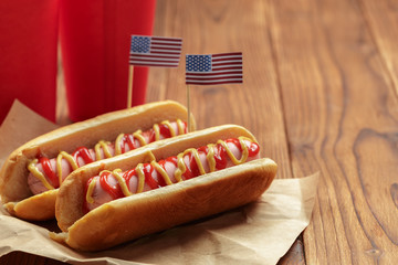 Hot dogs on wooden background