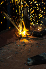 the worker cutting steel