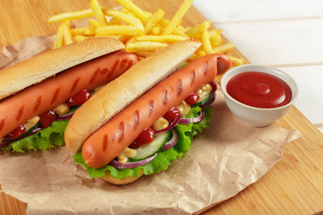 Hot dogs on wooden background