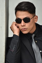 Young Security Guard Staring Wearing Sunglasses