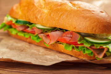 sandwich on a wooden table