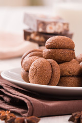 Hazelnut shortbread sandwiches filled with chocolate cream 