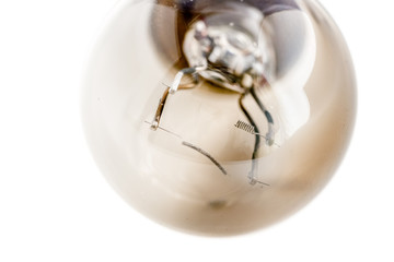 Car light bulb blown. Macro detail. White isolated.
