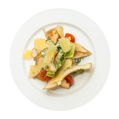Caesar Salad Top View. Chicken Caesar Salad  Isolated on White Background. Caesar Salad with grilled chicken on plate