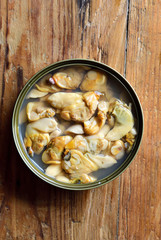 a can of clam on a table