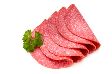Salami slices isolated on the white background.