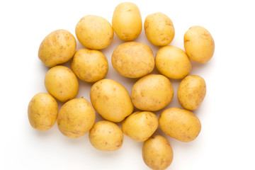 New potato and rosemarin isolated on white background close up.