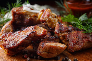 Pork shish kebab with herb sauce and onion