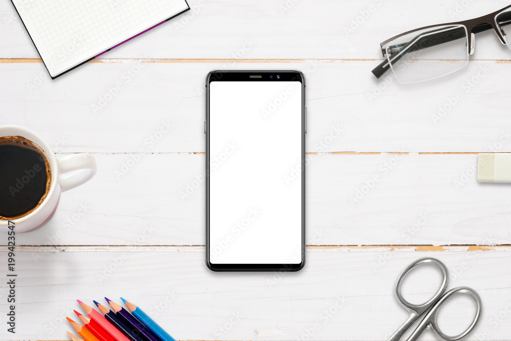 Poster Hero header image on work desk with modern smart phone with isolated display for mockup, app, web site presentation. Flat lay, top view.