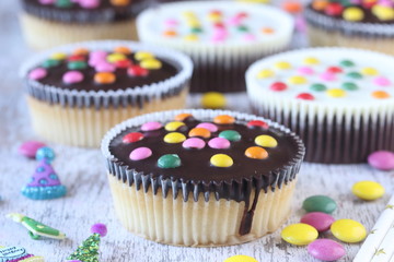 Cupcakes with sugar coated chocolate