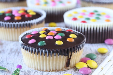 Cupcakes with sugar coated chocolate