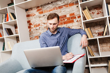 Young man with a laptop