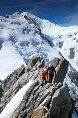 Printed kitchen splashbacks Mountaineering mountain guide and a male client on a rocky ridge heading towards a high summit in the French Alps near Chamonix