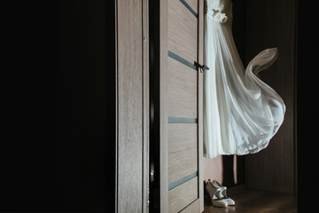 hanging on the wardrobe wedding dress