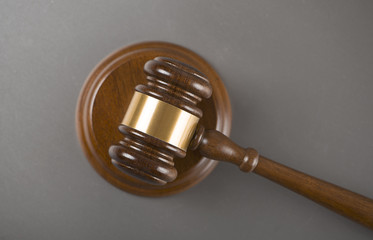 Wooden mallet used by a judge or at an auction. Concept
