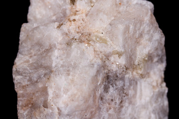 Macro mineral stone Wollastonite on black background