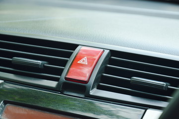 red button for open emergency light in car