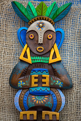 Otavalo, Ecuador- March 24, 2018: indigenous colourful wood mask on display at the artisan market