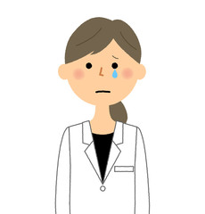 白衣の女性　泣く