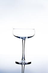 empty glass shadow on table