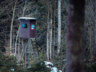 Deer hunting post in winter forest. Winterberg, Germany.