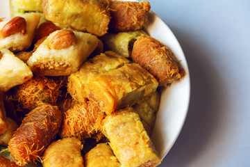 oriental sweets on a white plate