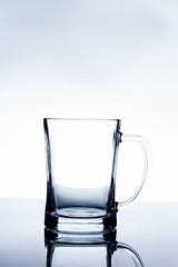 empty glass shadow on table