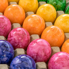 colorful easter eggs / Cardboard box with colored easter eggs 