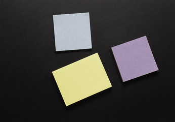 Notepad on chalk blackboard with copy space for design or add text message.