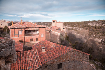 Fototapeta na wymiar View of Typical Roofs and Chimneys of the Village of Calatañazor, Spain